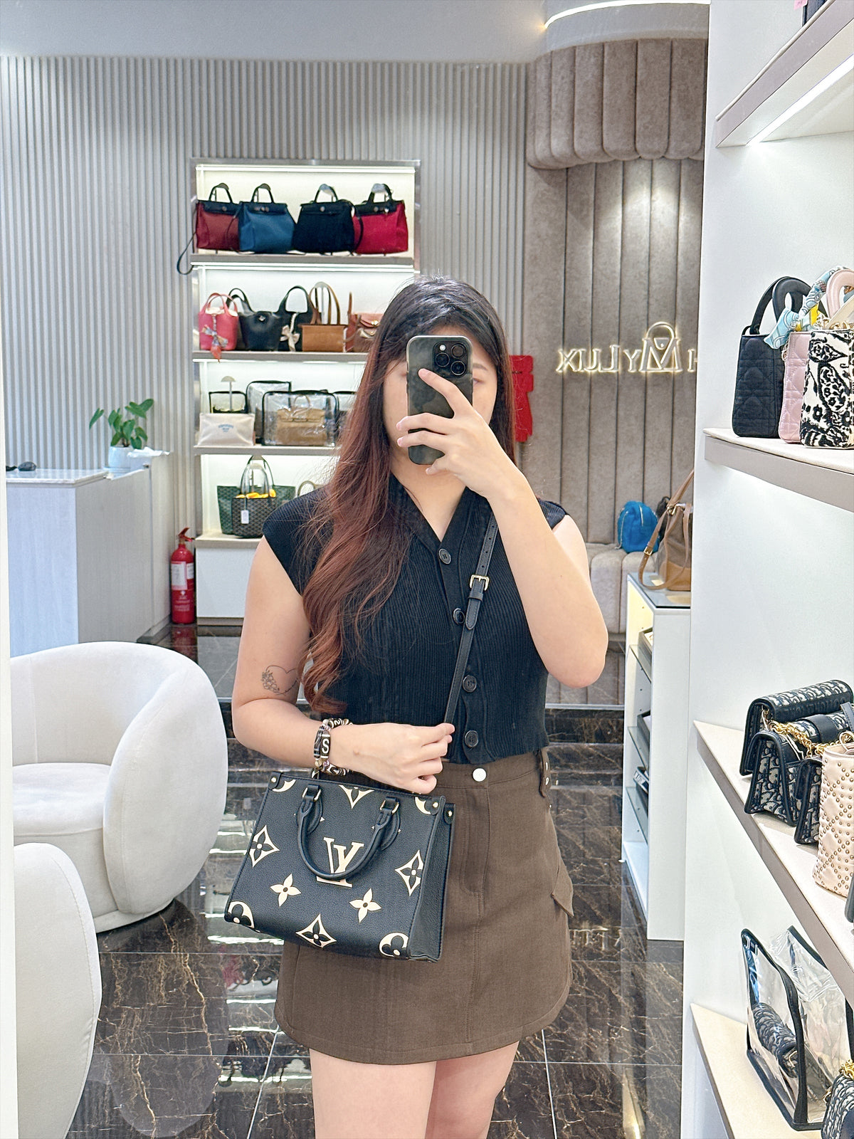 LV On The Go PM in Black/Creme