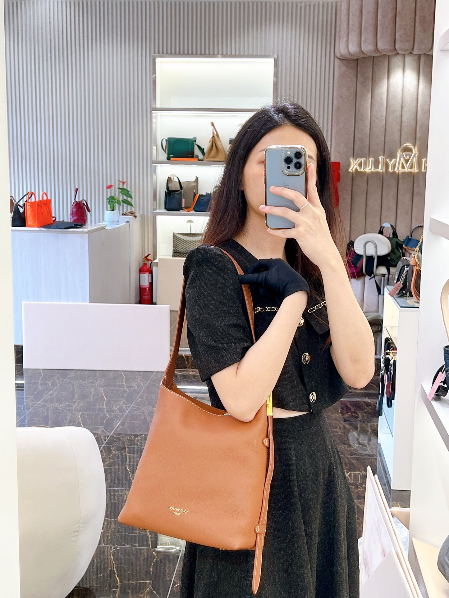 LV Low Key Hobo in PM in Cognac