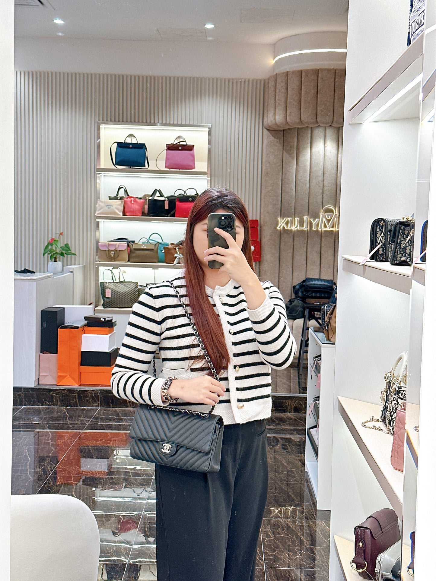 Chanel Classic Flap Medium in Black Chevron Caviar Leather