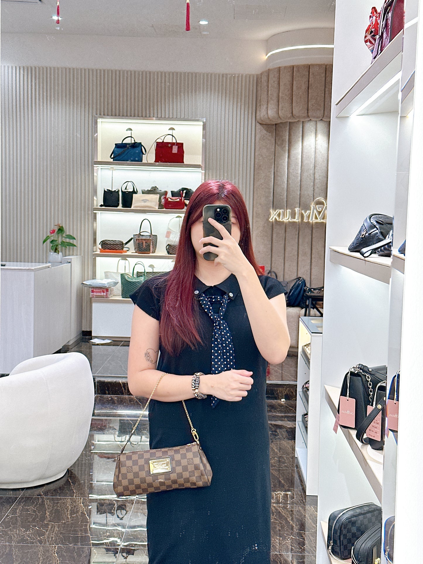 LV Damier Ebene Eva Clutch