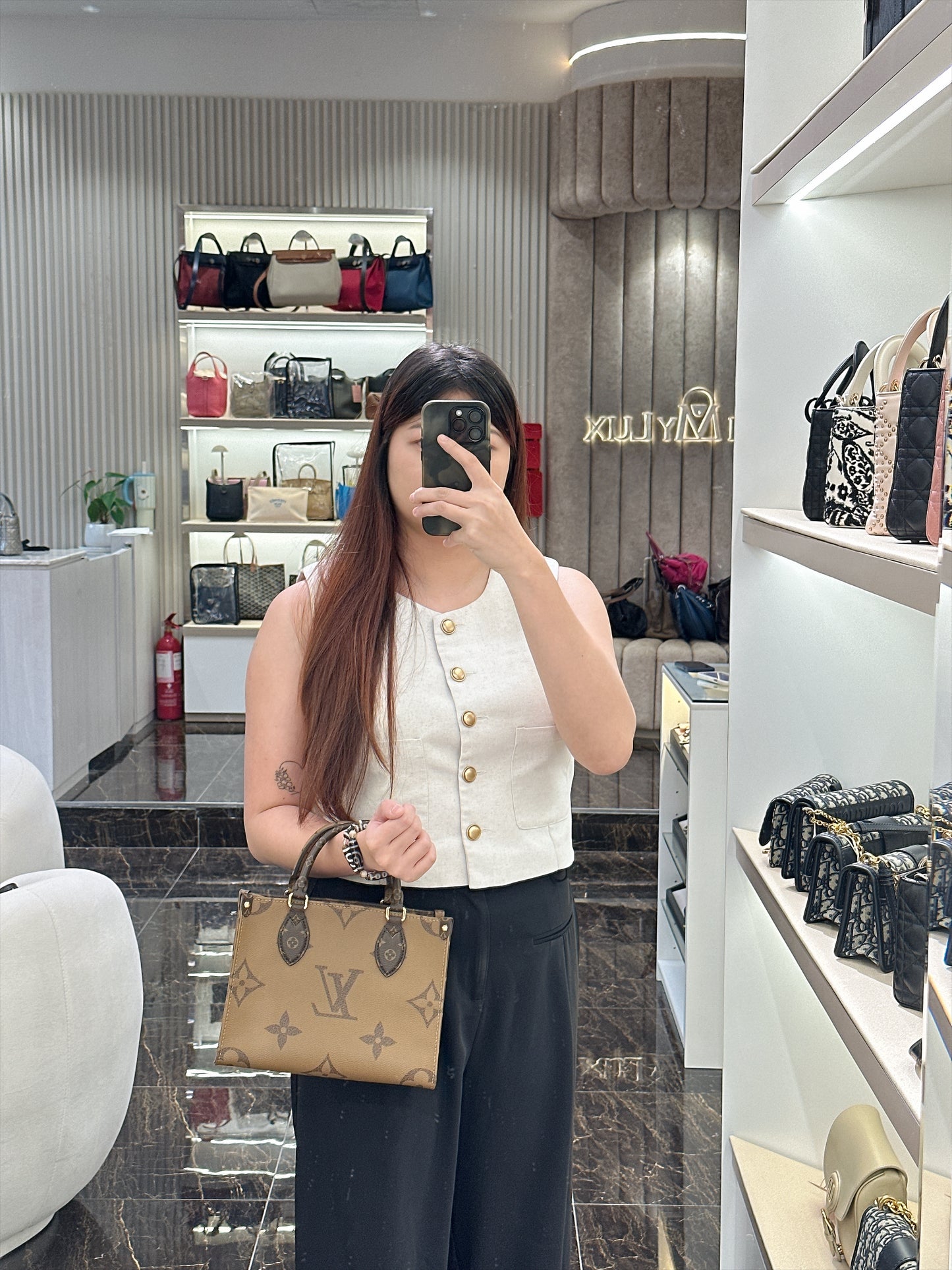 LV On The Go PM in Reverse Monogram