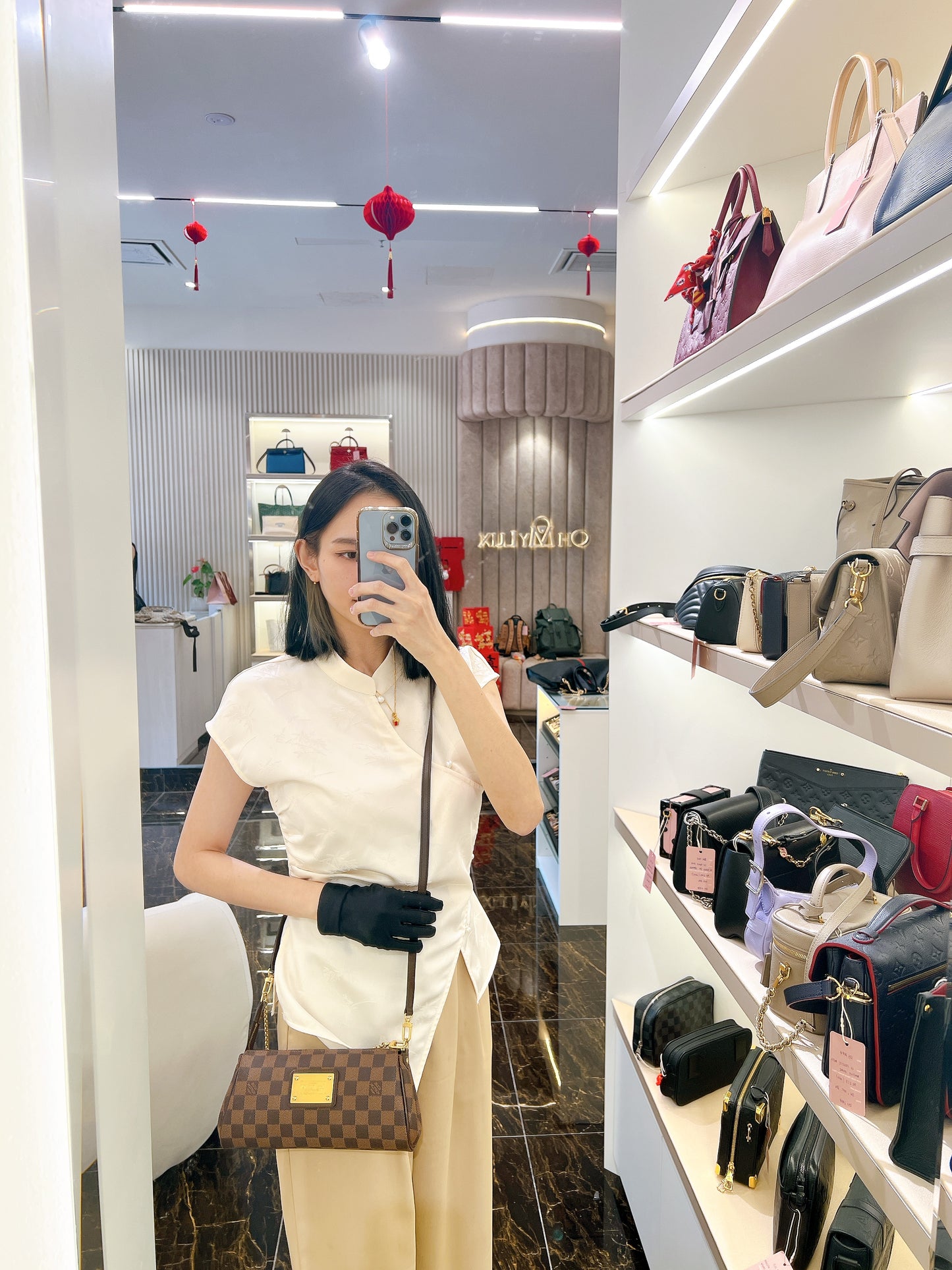 LV Damier Ebene Eva Clutch