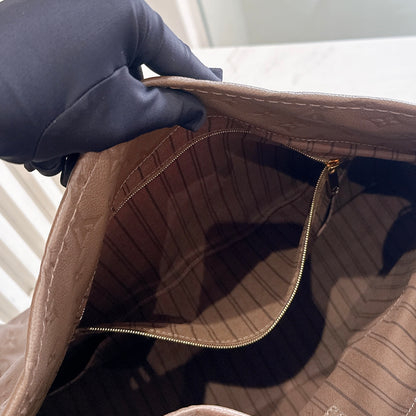 LV Artsy MM Monogram Empreinte Leather in Terre
