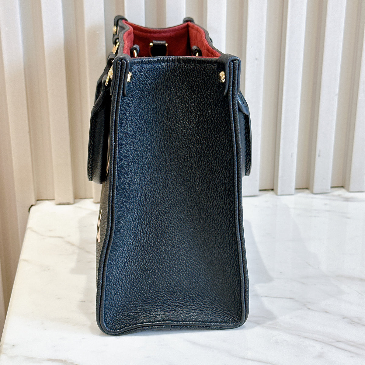 LV On The Go PM in Black/Creme