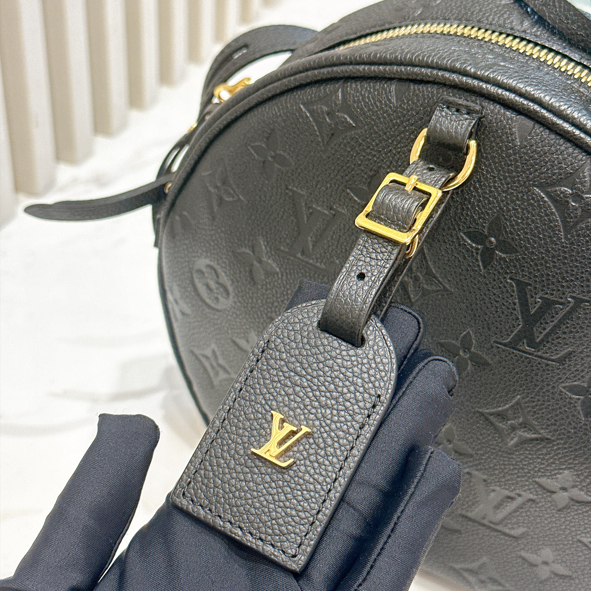 LV Boite Chapeau Souple MM in Black Empreinte