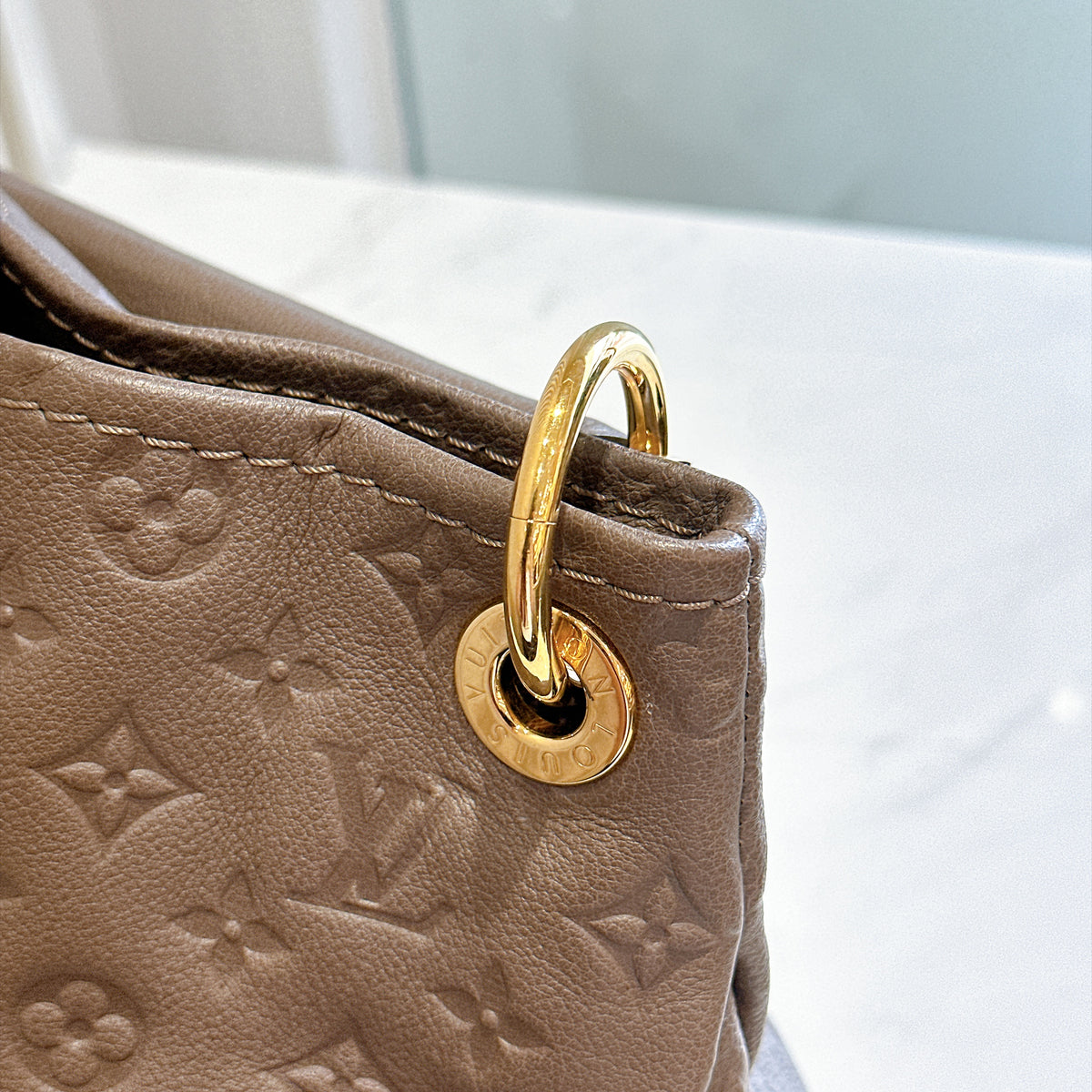 LV Artsy MM Monogram Empreinte Leather in Terre