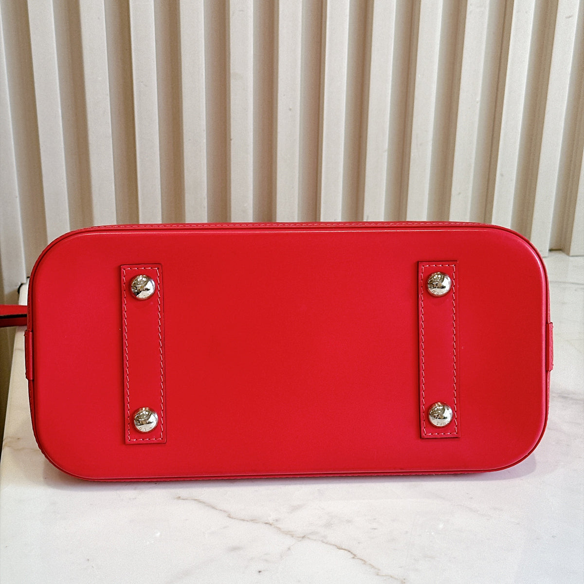 LV Alma PM in Pink Epi Leather