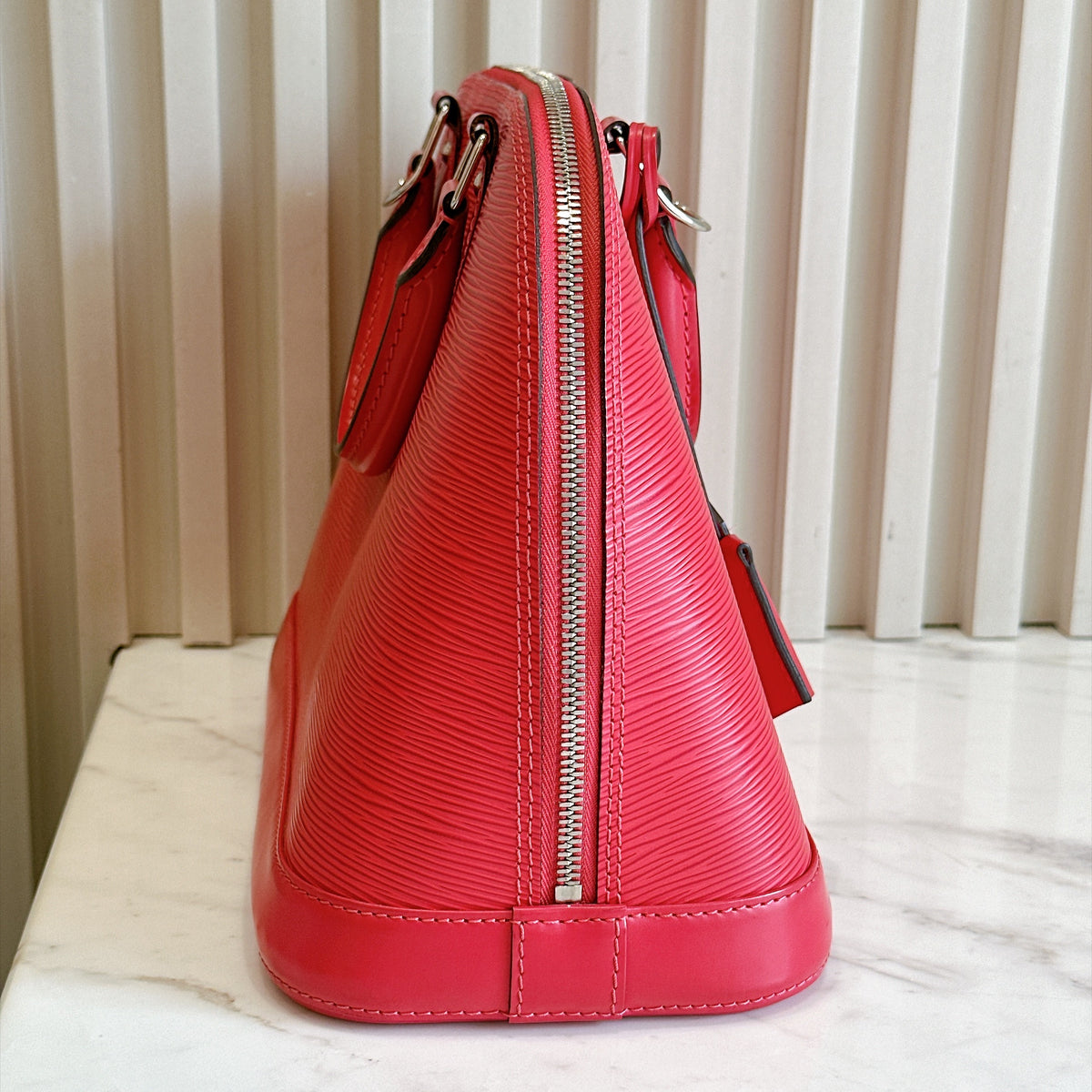 LV Alma PM in Pink Epi Leather