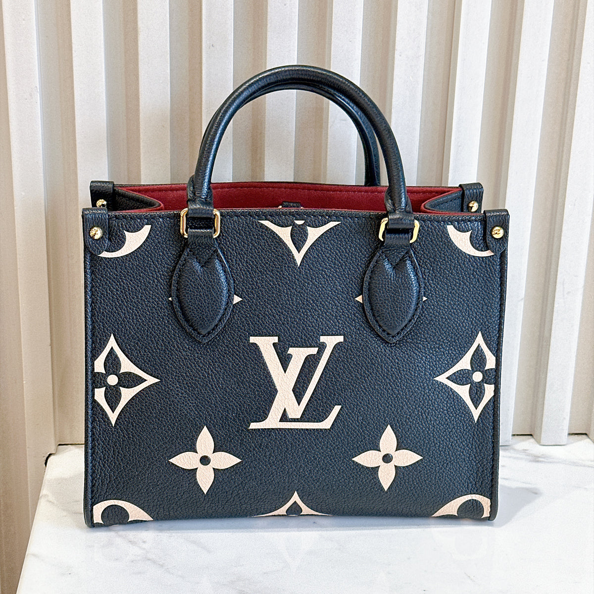 LV On The Go PM in Black/Creme