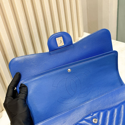 Chanel Jumbo In Blue Chevron Caviar SHW