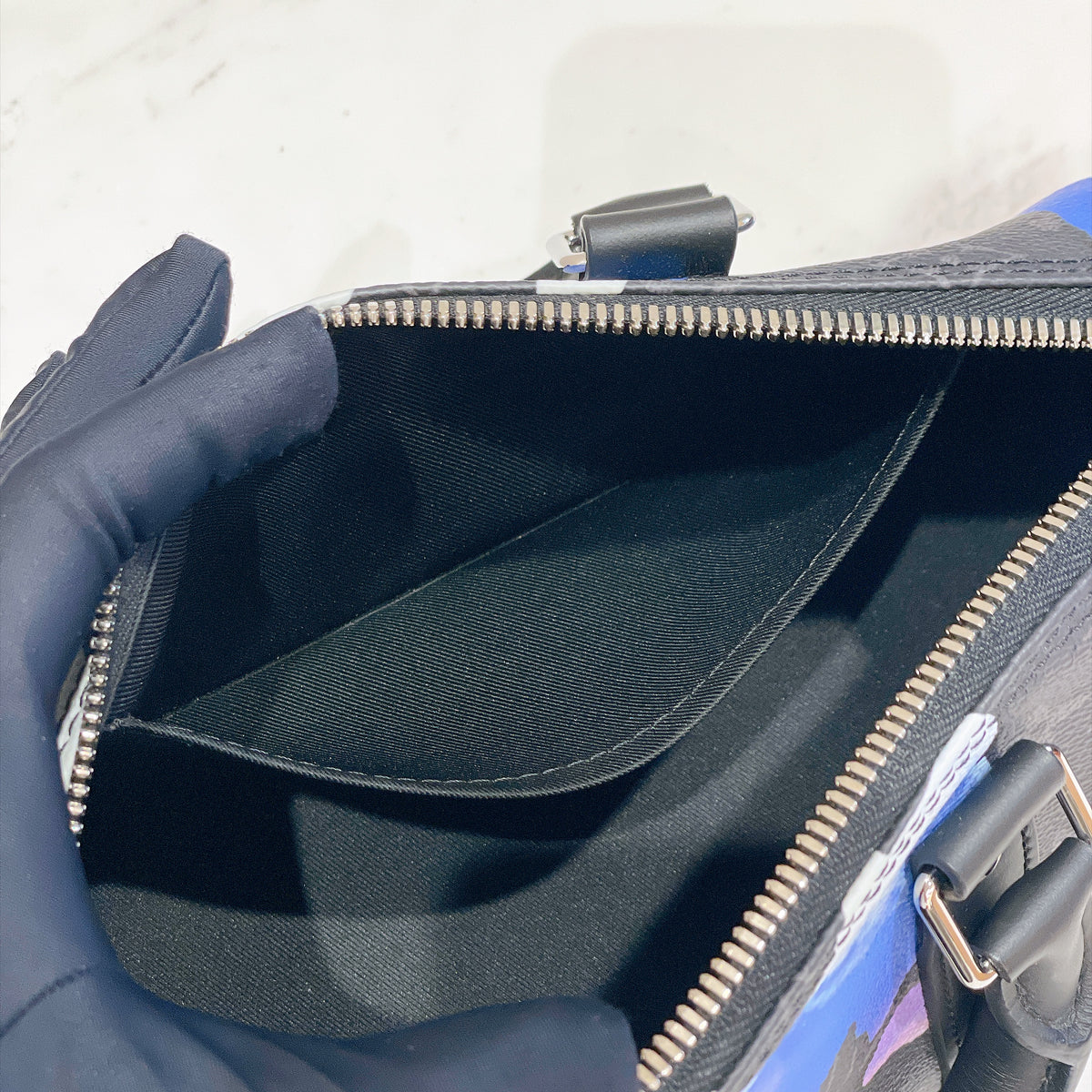 LV Keepall 25 in Monogram Sunrise