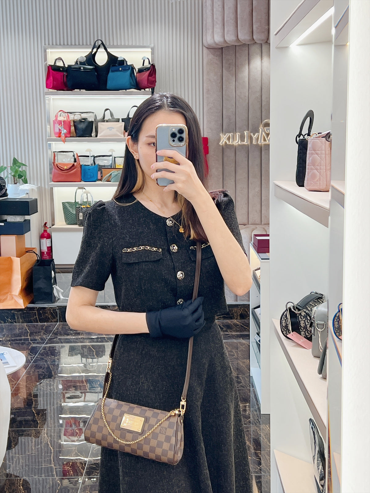 LV Damier Ebene Eva Clutch