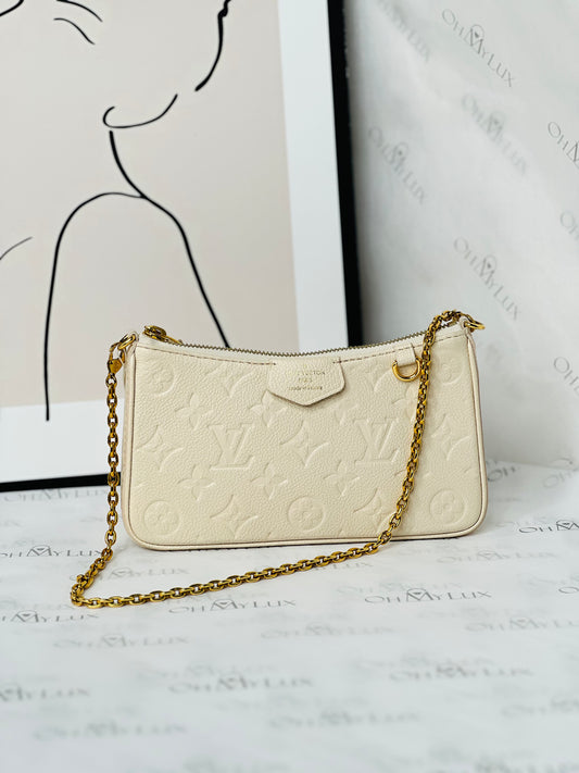 LV Easy Pouch On Strap In Creme