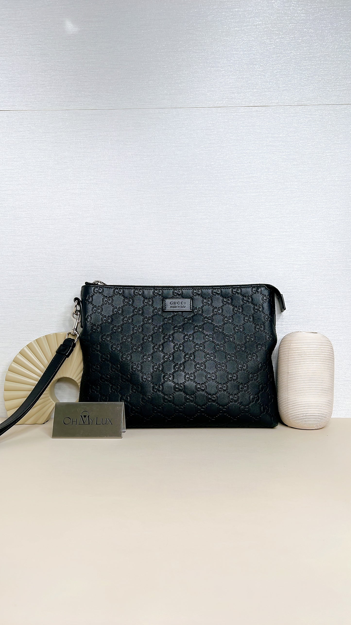 Gucci GG Guccissima Clutch in Black