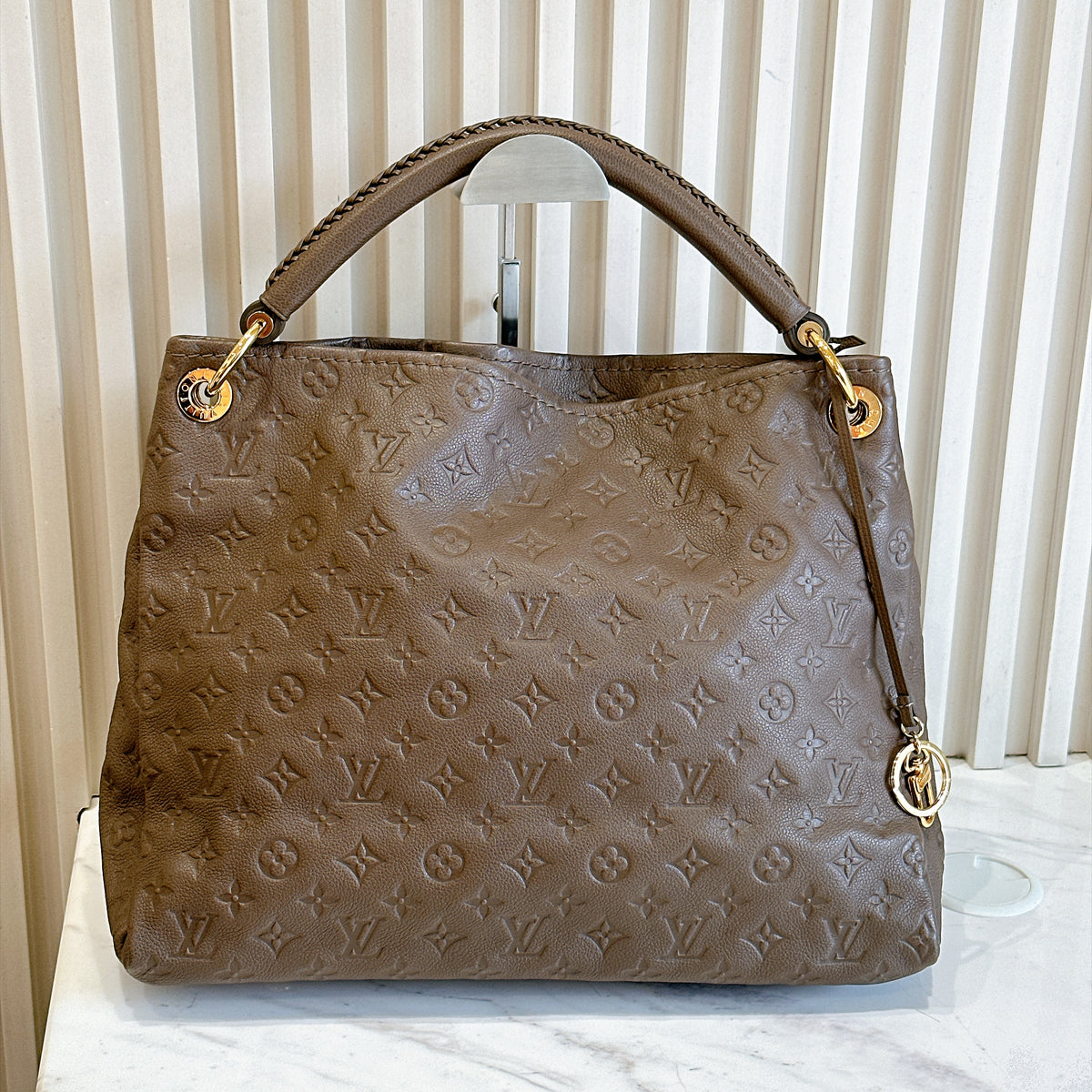 LV Artsy MM Monogram Empreinte Leather in Terre