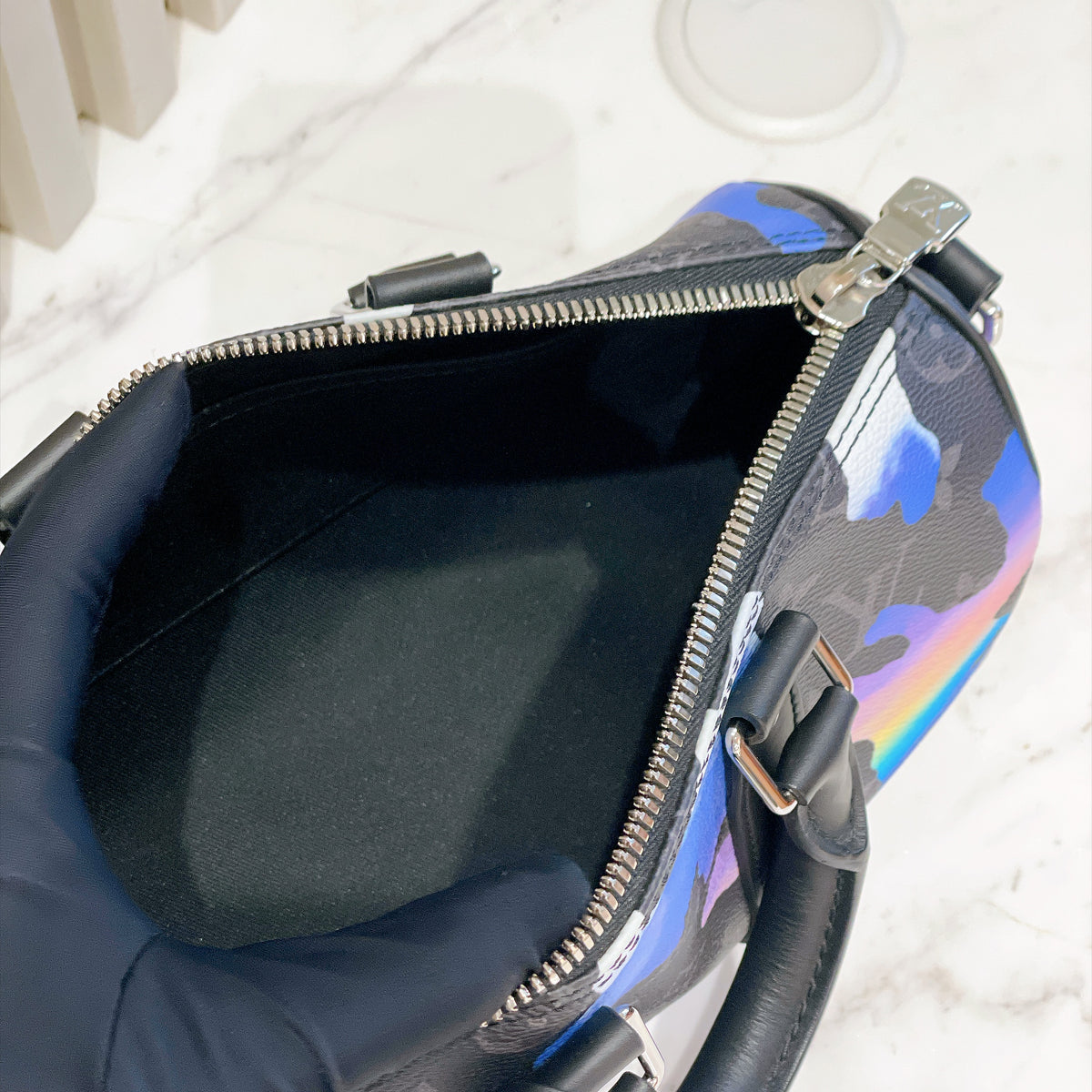 LV Keepall 25 in Monogram Sunrise