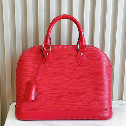 LV Alma PM in Pink Epi Leather