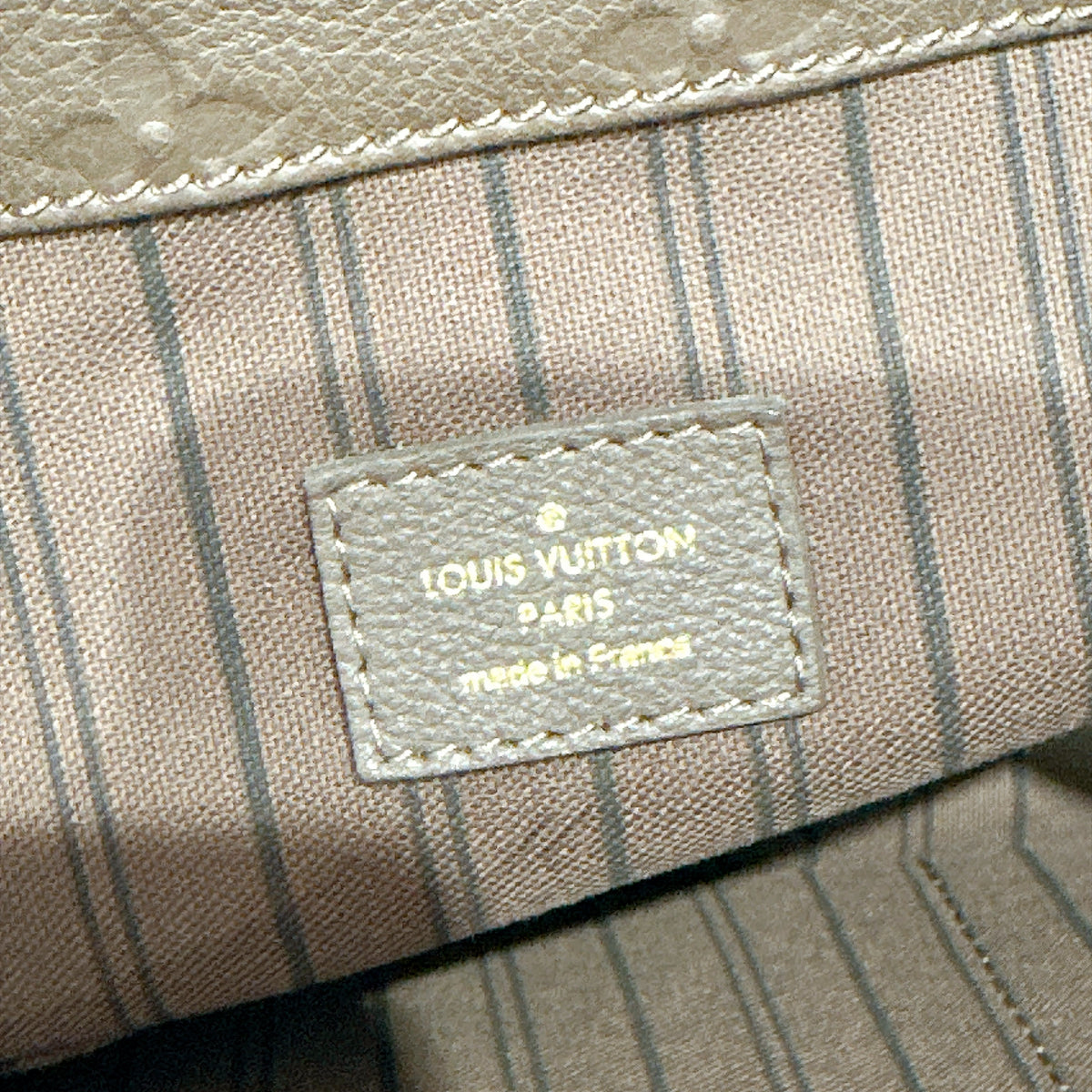 LV Artsy MM Monogram Empreinte Leather in Terre