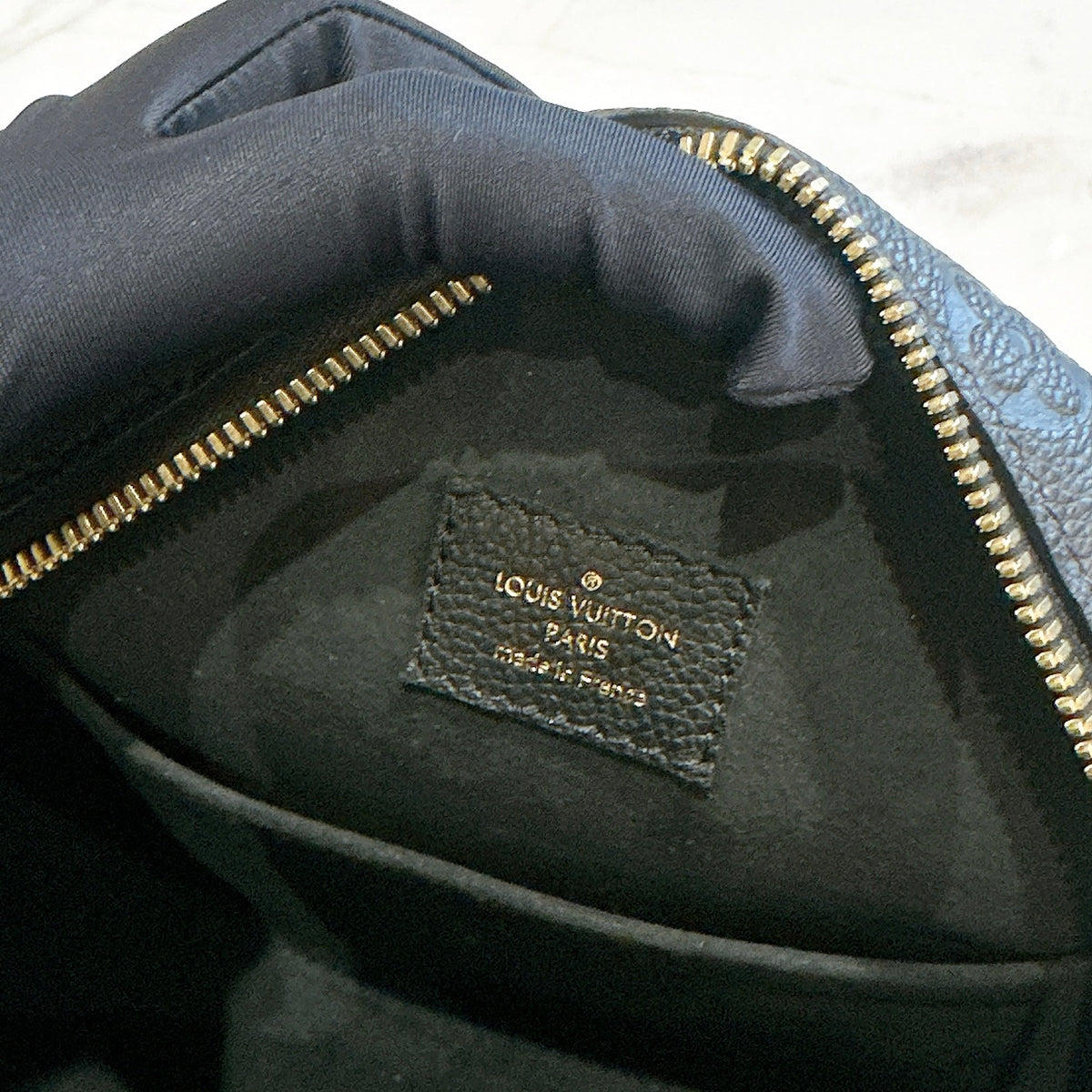 LV Boite Chapeau Souple MM in Black Empreinte