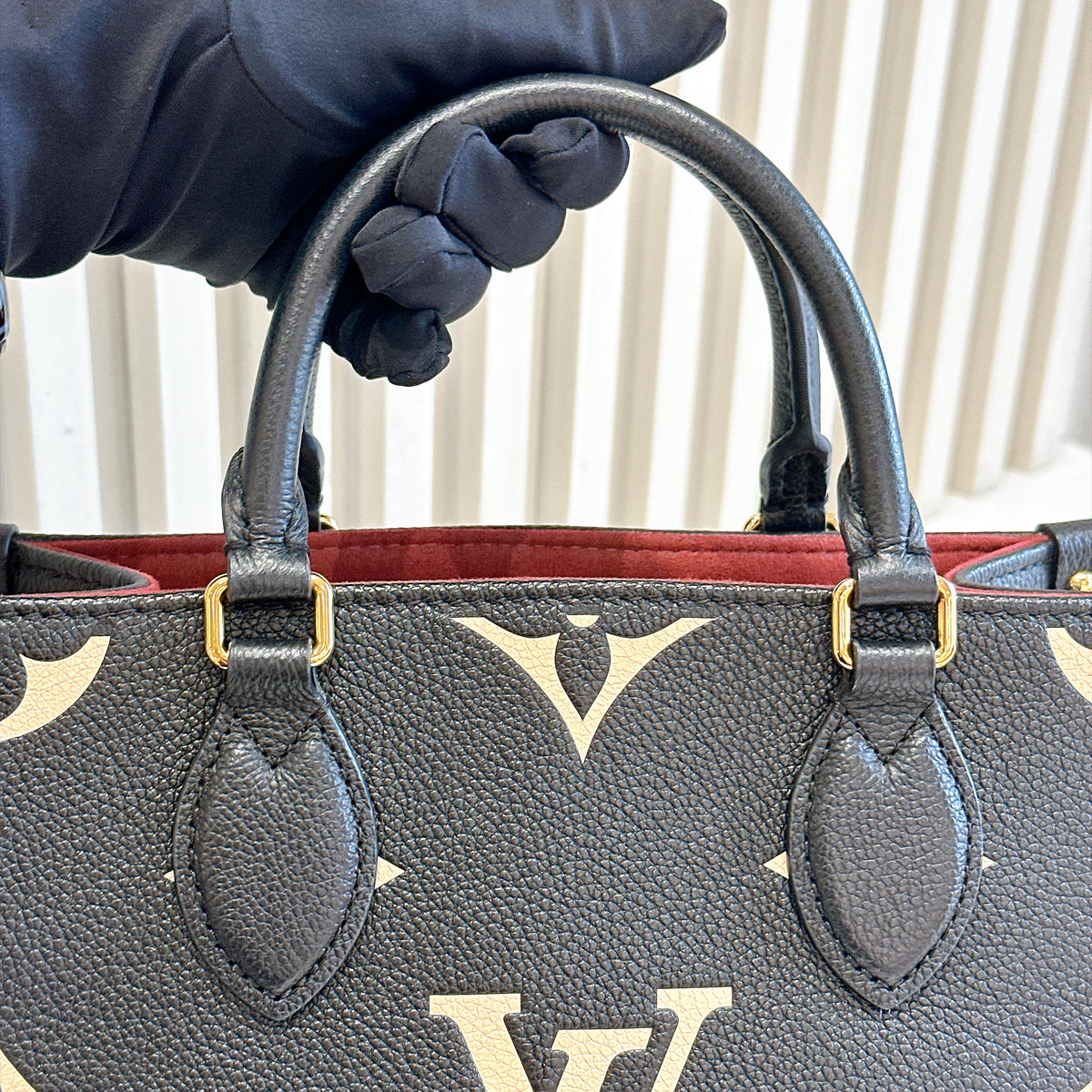 LV On The Go PM in Black/Creme