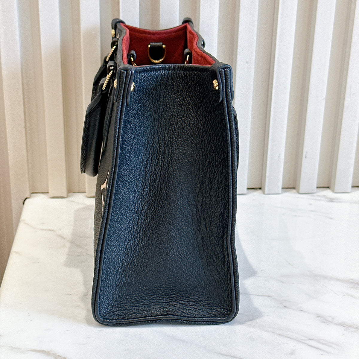 LV On The Go PM in Black/Creme