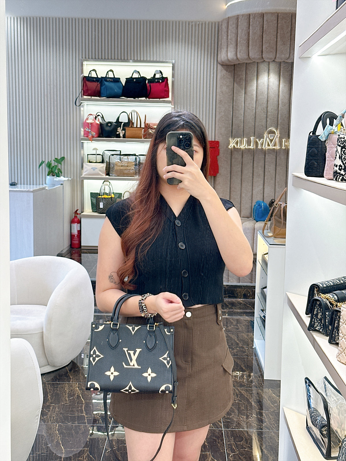 LV On The Go PM in Black/Creme