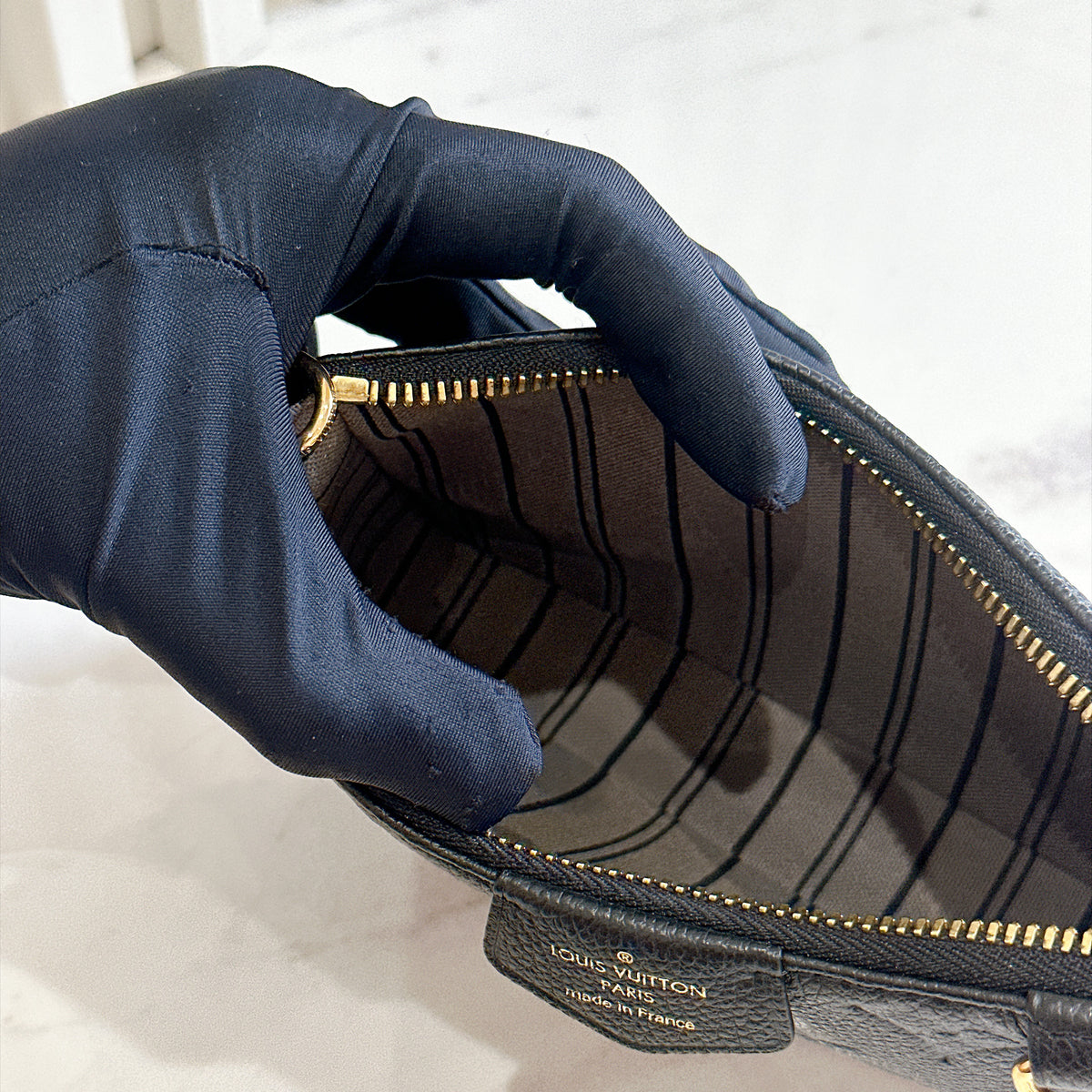 LV Easy Pouch in Black Empreinte Leather