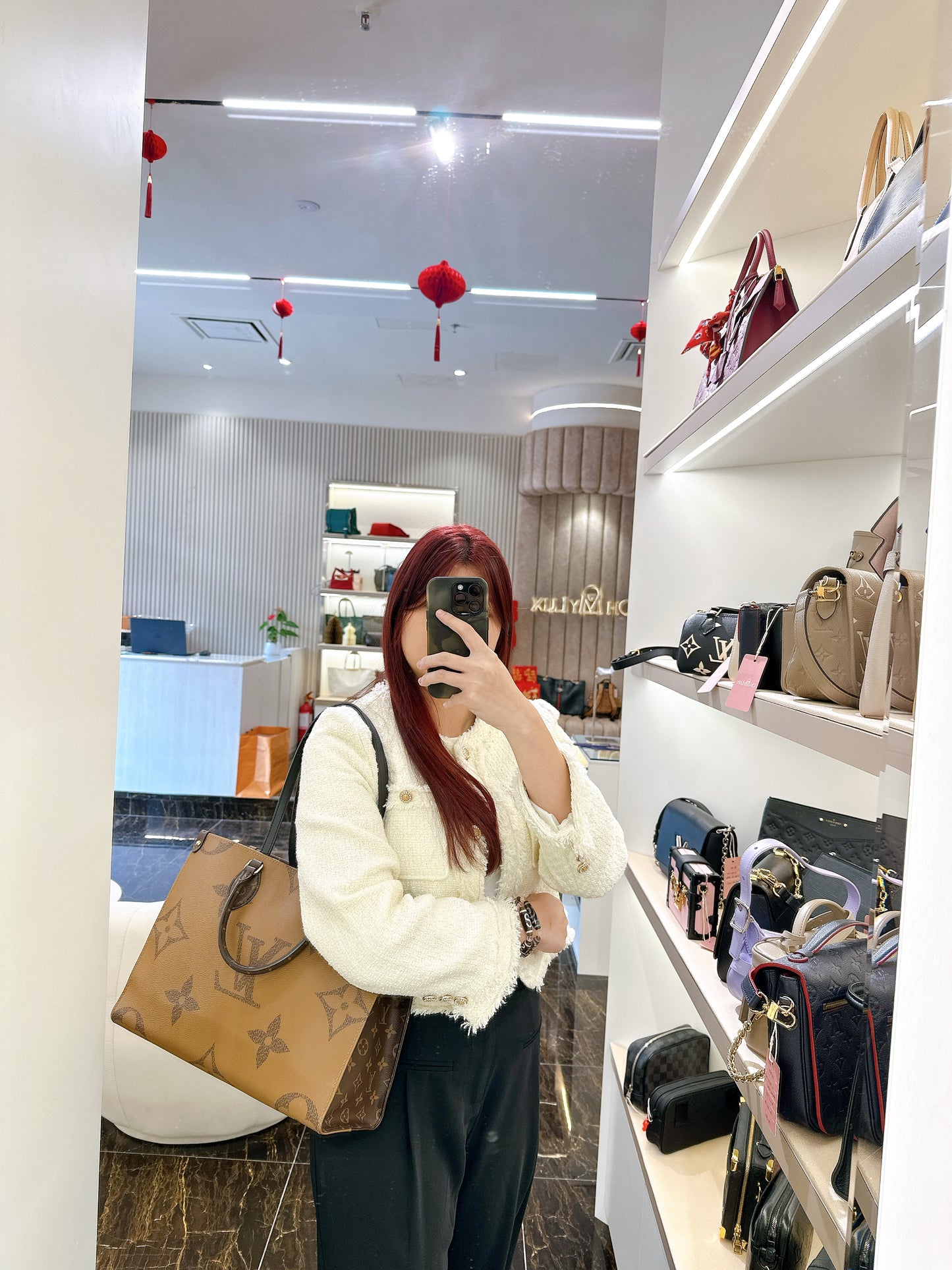 LV On The Go MM in Reverse Monogram