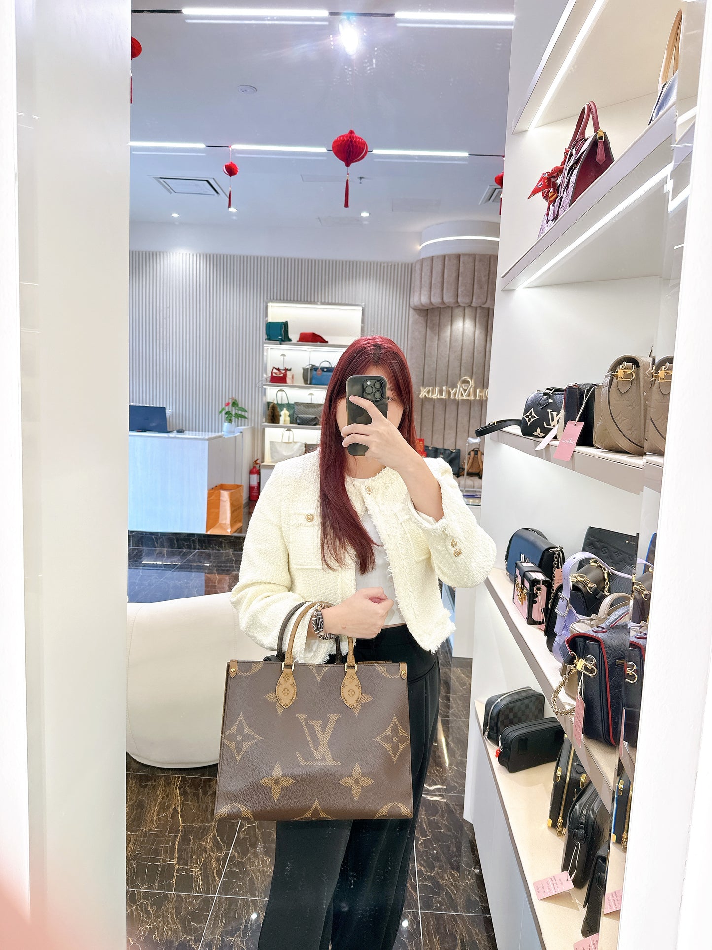 LV On The Go MM in Reverse Monogram