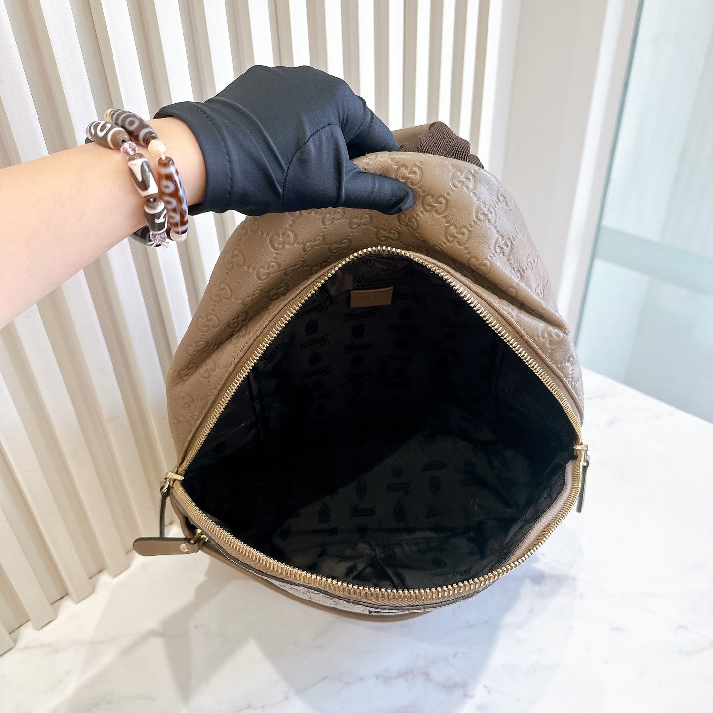 Gucci Guccissima Backpack in Brown