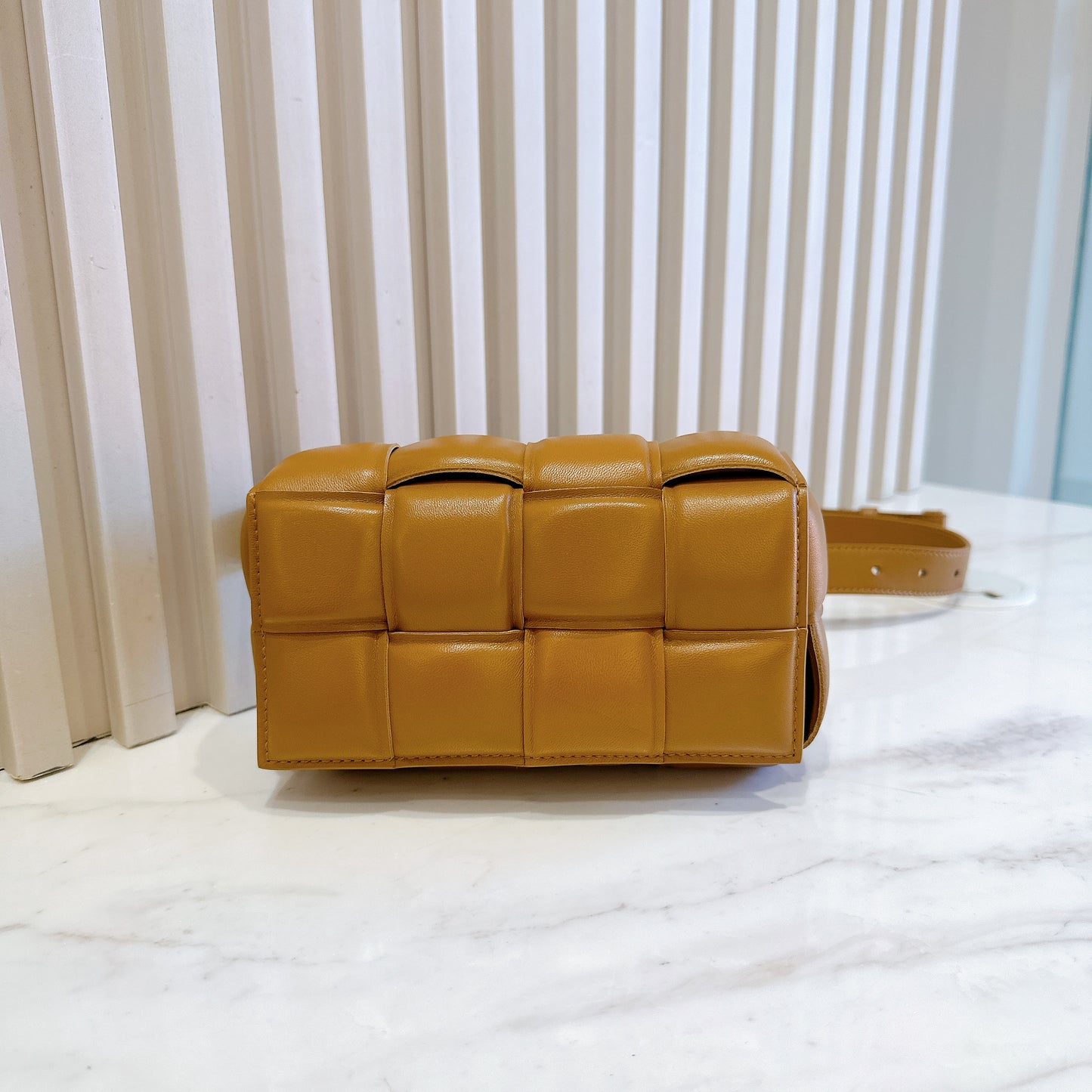 Bottega Veneta Padded Cassette Belt Bag in Caramel