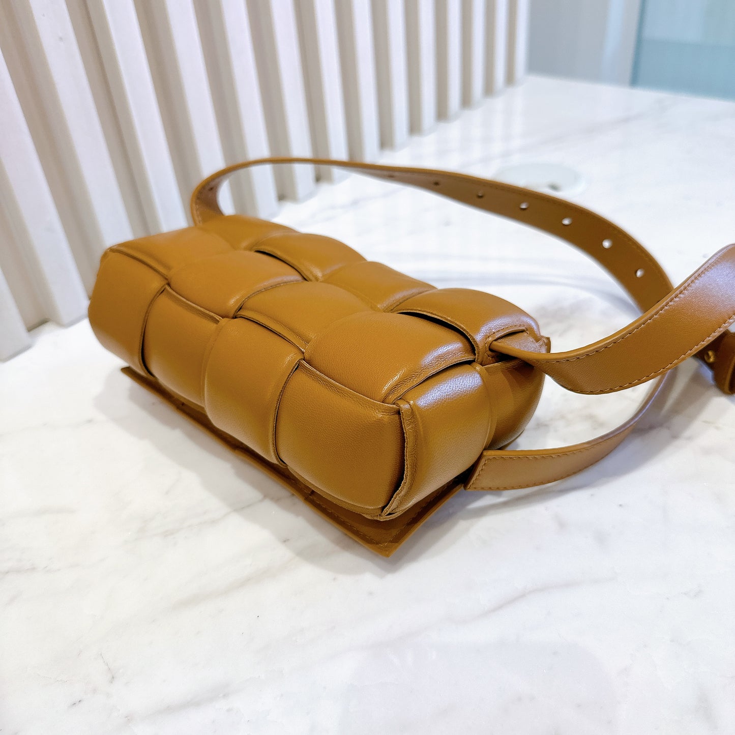 Bottega Veneta Padded Cassette Belt Bag in Caramel
