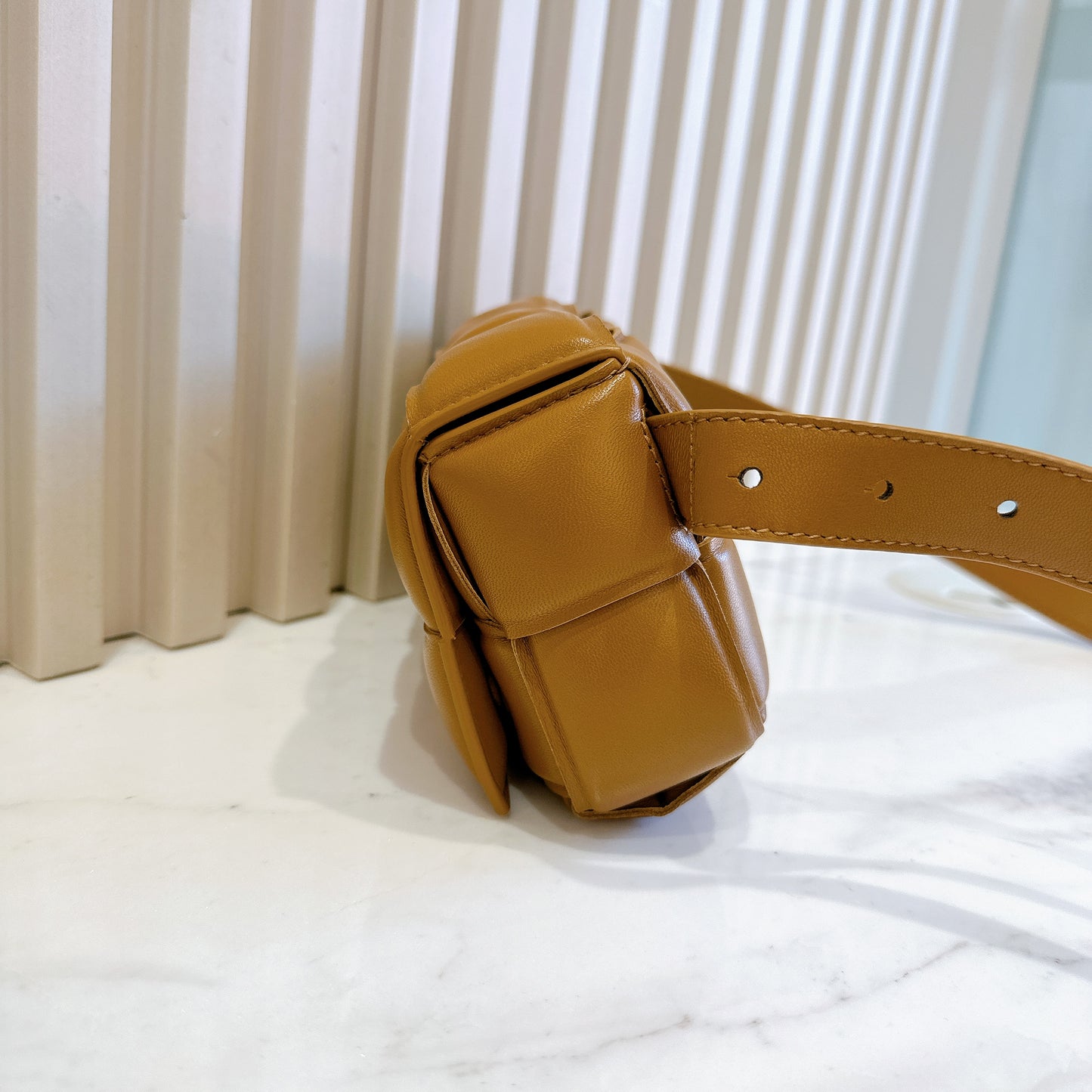 Bottega Veneta Padded Cassette Belt Bag in Caramel