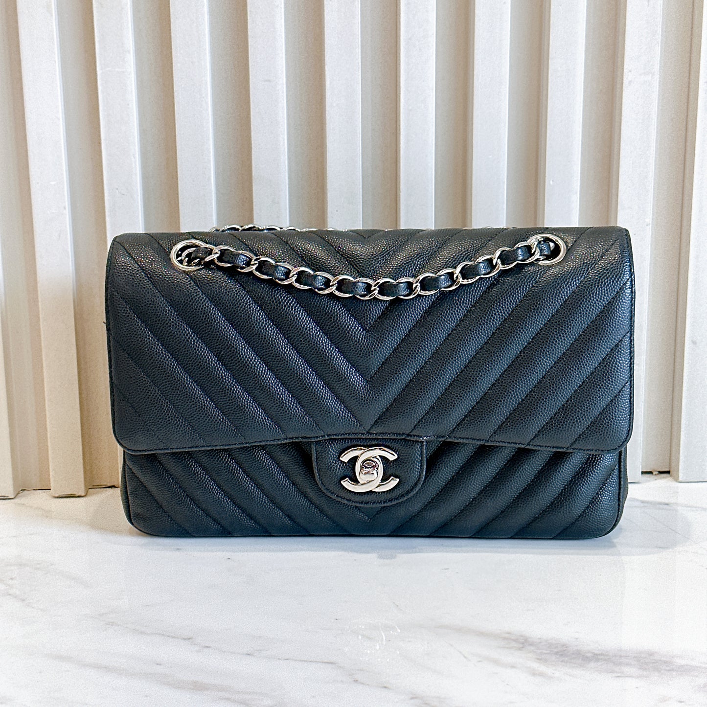 Chanel Classic Flap Medium in Black Chevron Caviar Leather