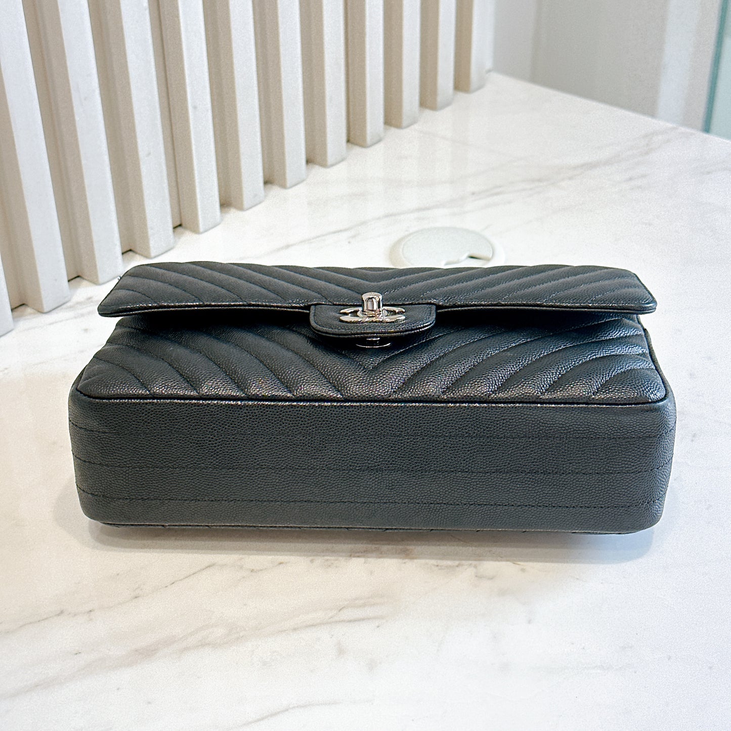 Chanel Classic Flap Medium in Black Chevron Caviar Leather