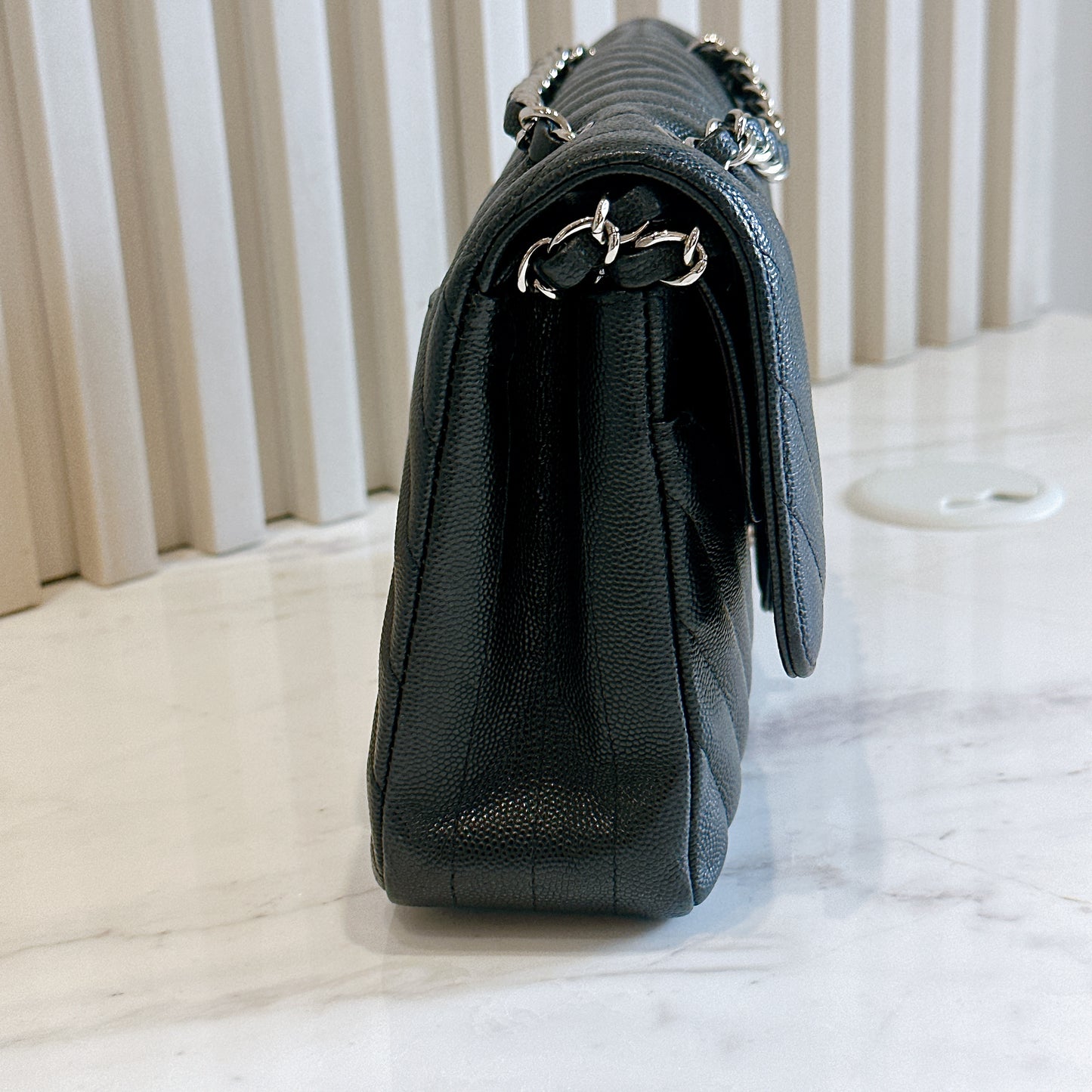 Chanel Classic Flap Medium in Black Chevron Caviar Leather