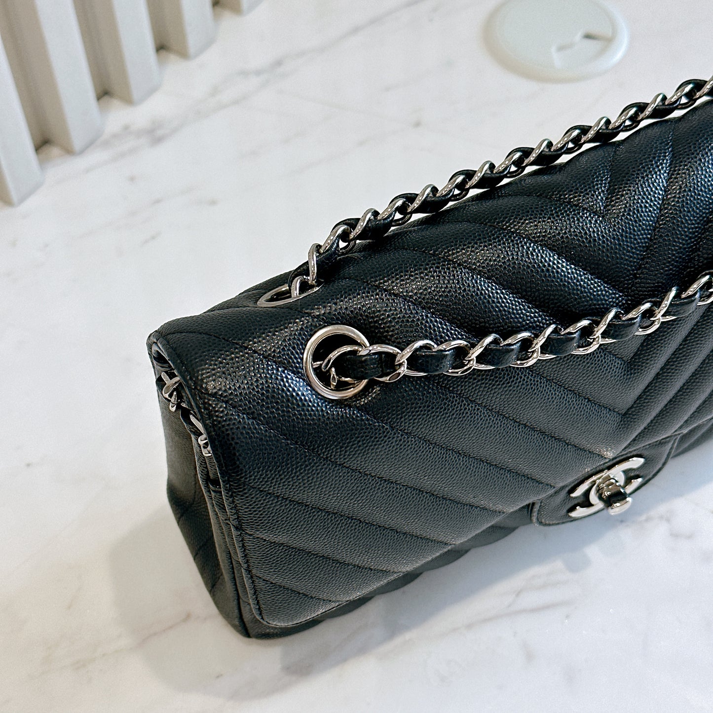 Chanel Classic Flap Medium in Black Chevron Caviar Leather