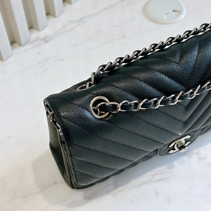 Chanel Classic Flap Medium in Black Chevron Caviar Leather
