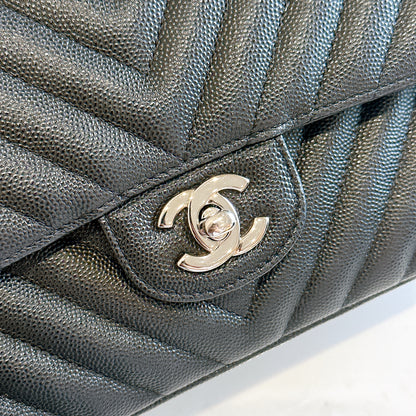 Chanel Classic Flap Medium in Black Chevron Caviar Leather