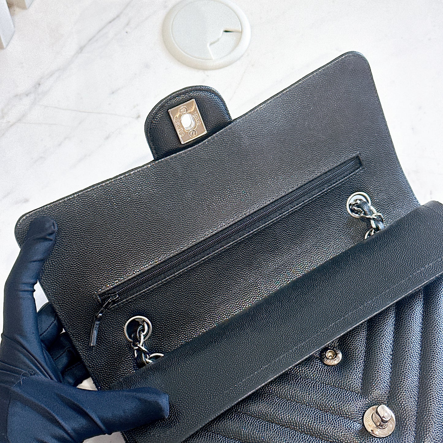Chanel Classic Flap Medium in Black Chevron Caviar Leather