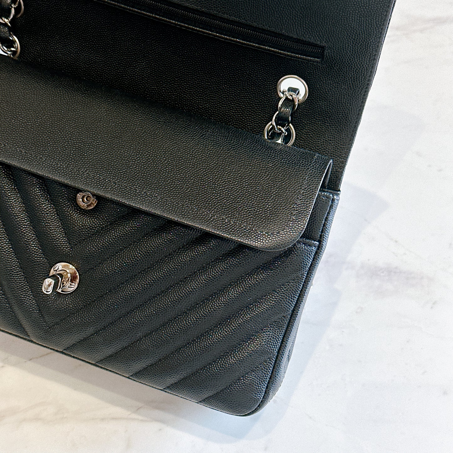 Chanel Classic Flap Medium in Black Chevron Caviar Leather