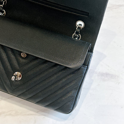 Chanel Classic Flap Medium in Black Chevron Caviar Leather