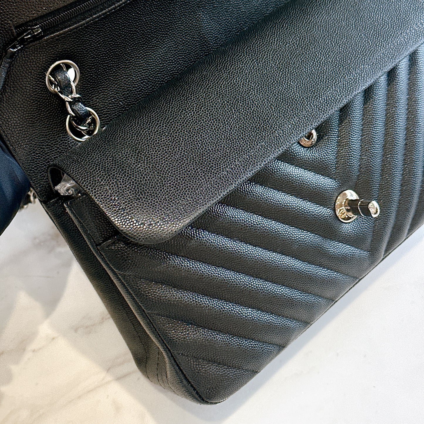 Chanel Classic Flap Medium in Black Chevron Caviar Leather