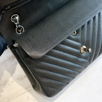 Chanel Classic Flap Medium in Black Chevron Caviar Leather