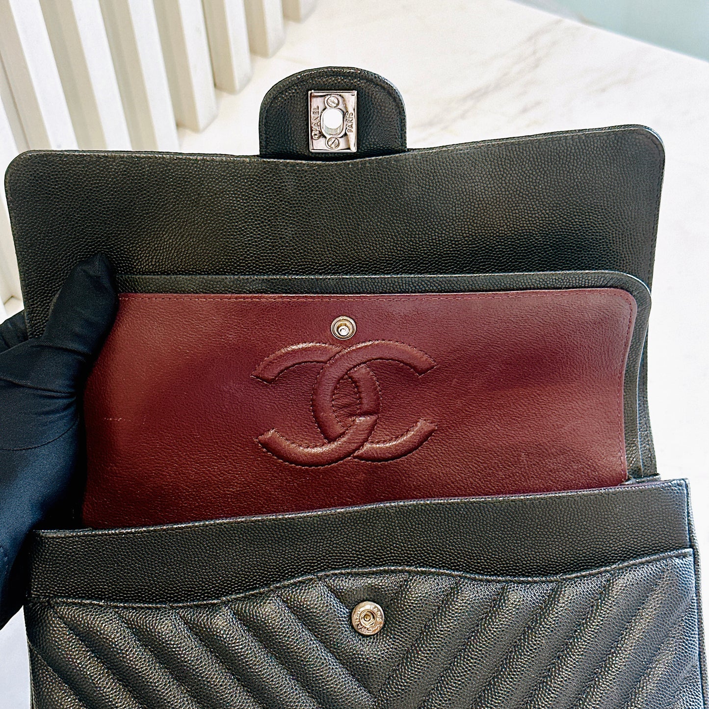 Chanel Classic Flap Medium in Black Chevron Caviar Leather