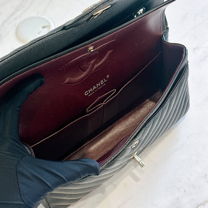 Chanel Classic Flap Medium in Black Chevron Caviar Leather