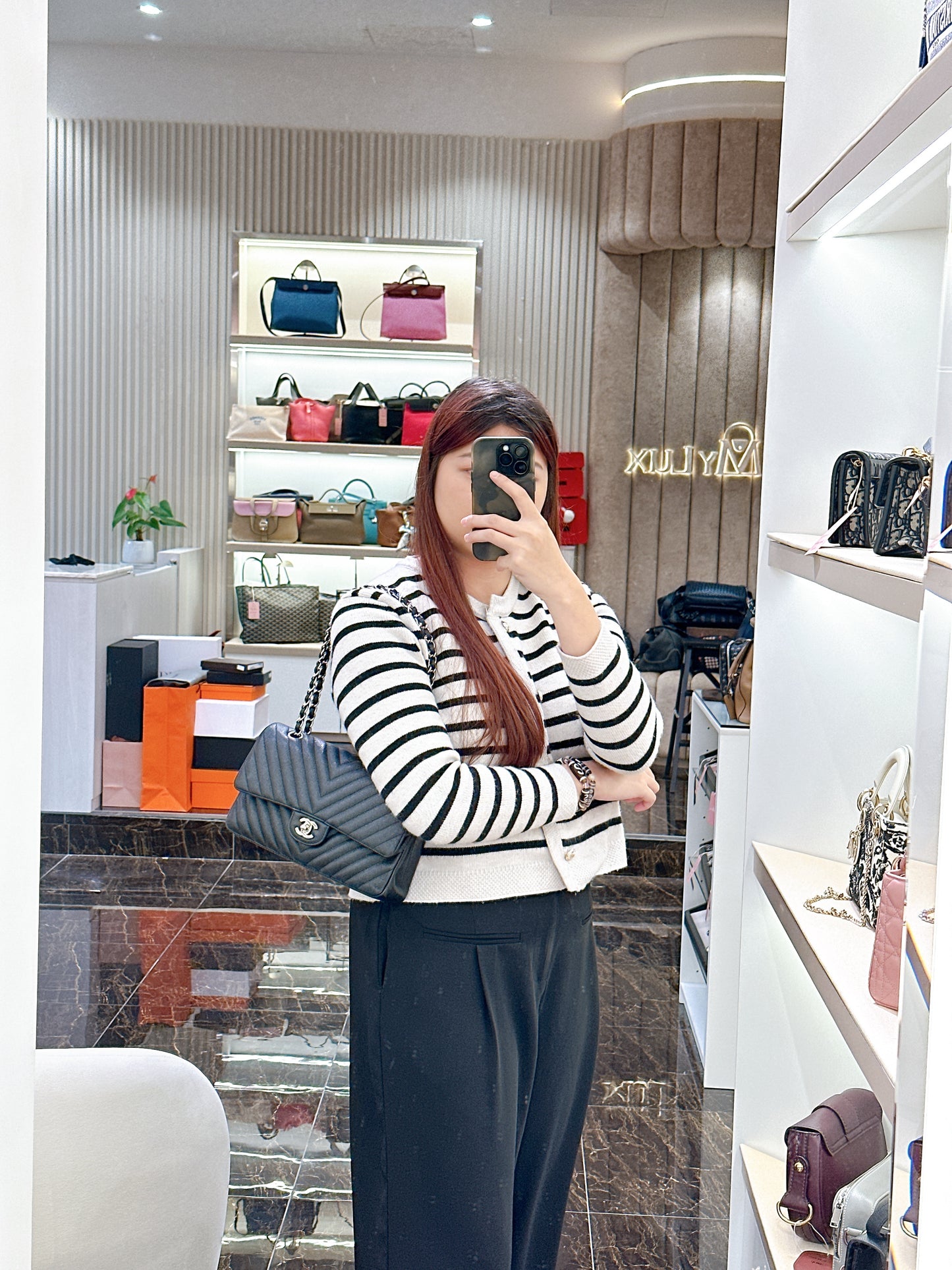 Chanel Classic Flap Medium in Black Chevron Caviar Leather