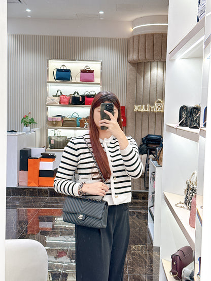 Chanel Classic Flap Medium in Black Chevron Caviar Leather
