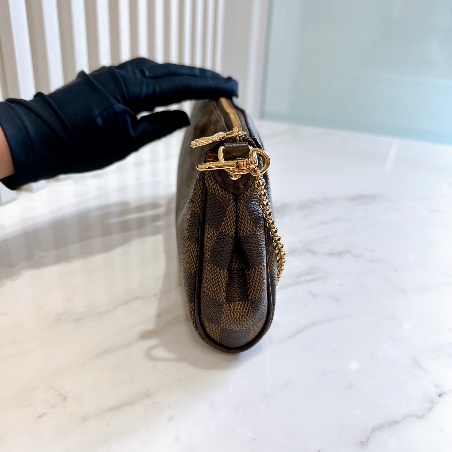 LV Damier Ebene Eva Clutch