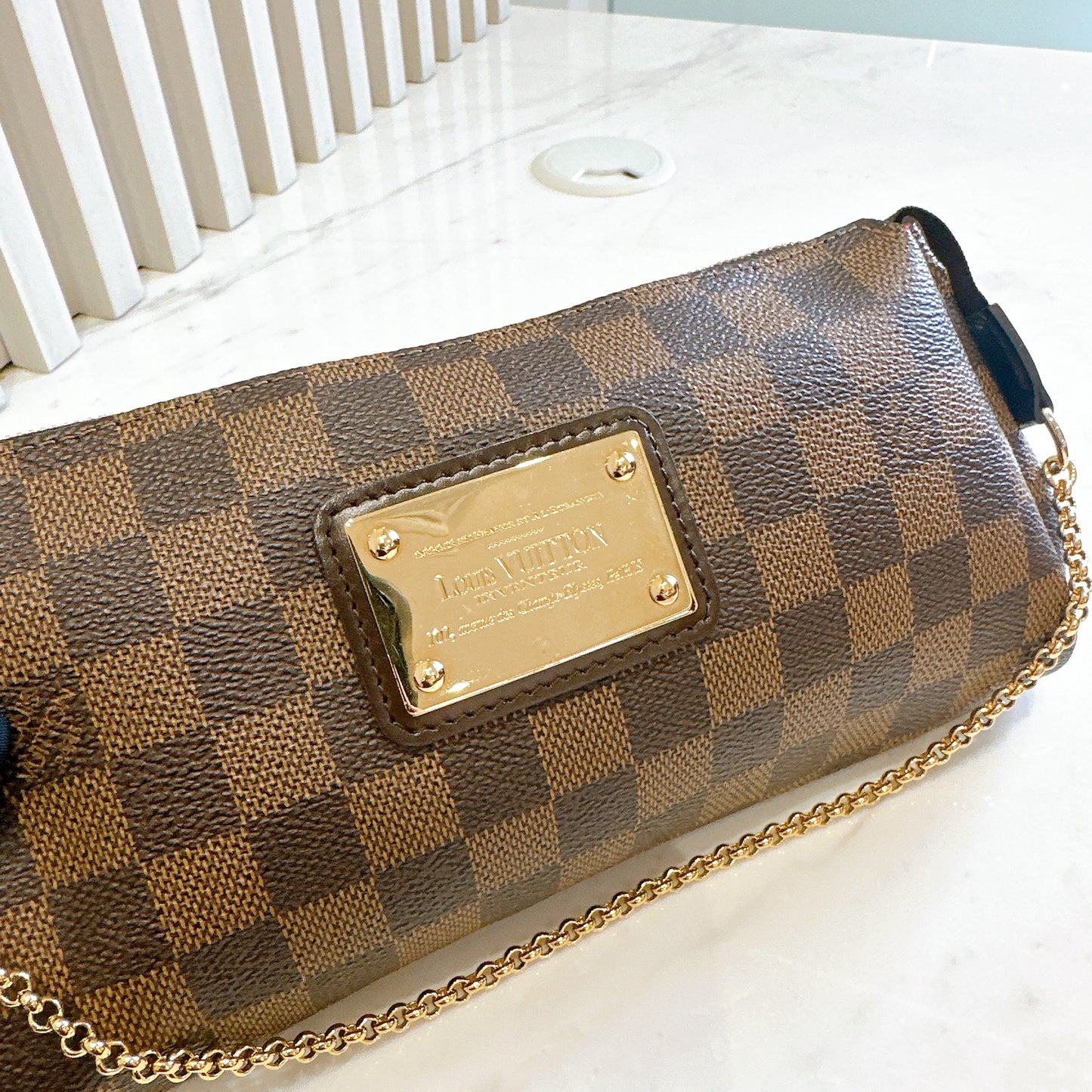 LV Damier Ebene Eva Clutch